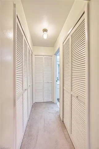 Hall with light carpet