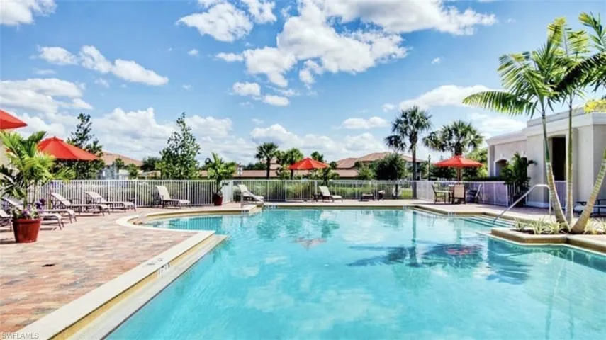 Community pool with a patio area