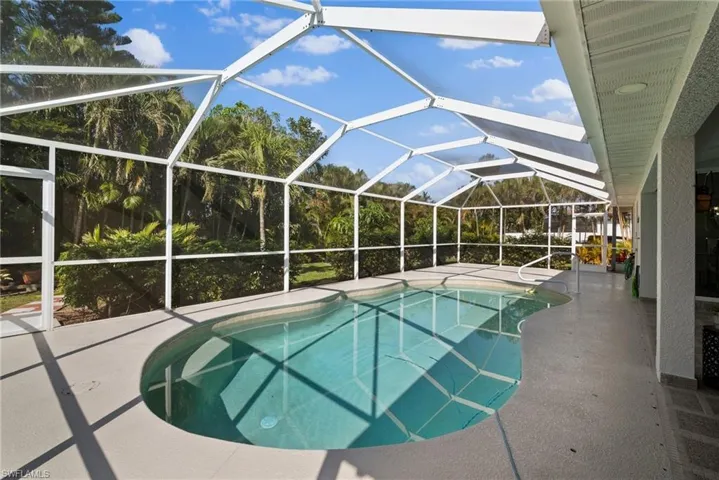 Swimming pool with a patio area