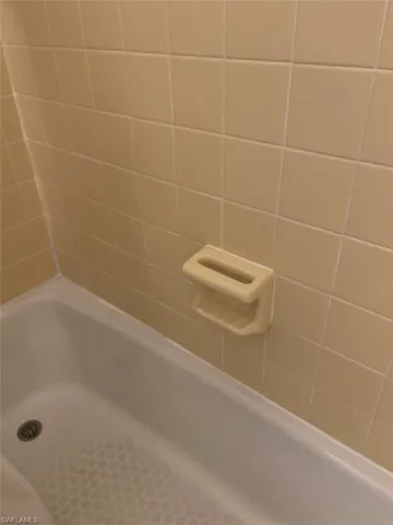 Bathroom featuring separate shower and tub