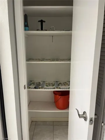 Linen closet has plenty of room to store all your bedding and towels