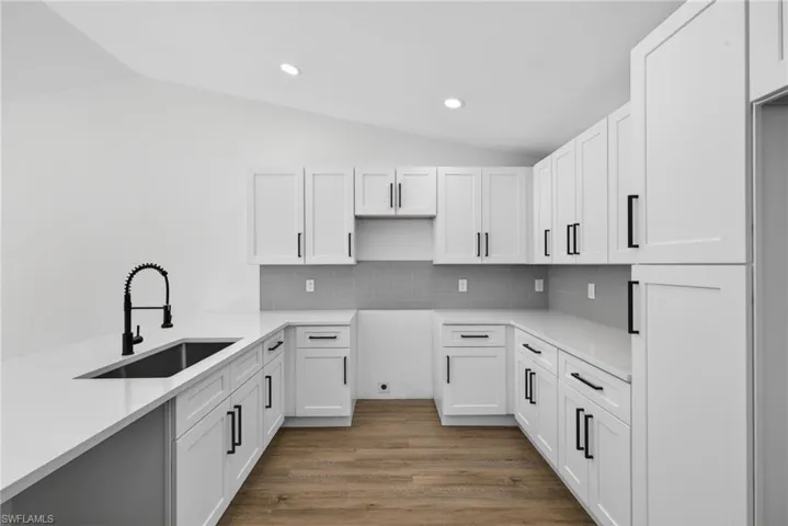 White Shaker Soft Close Cabinets with Black Hardware