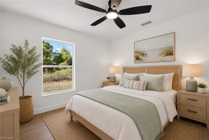 Guest Bed with New Wide Plank Vinyl Floors