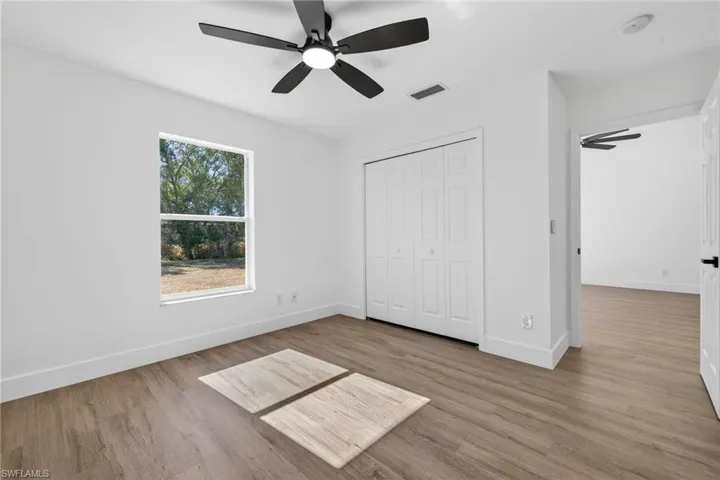 Primary Bedroom with New Vinyl Plank Floors