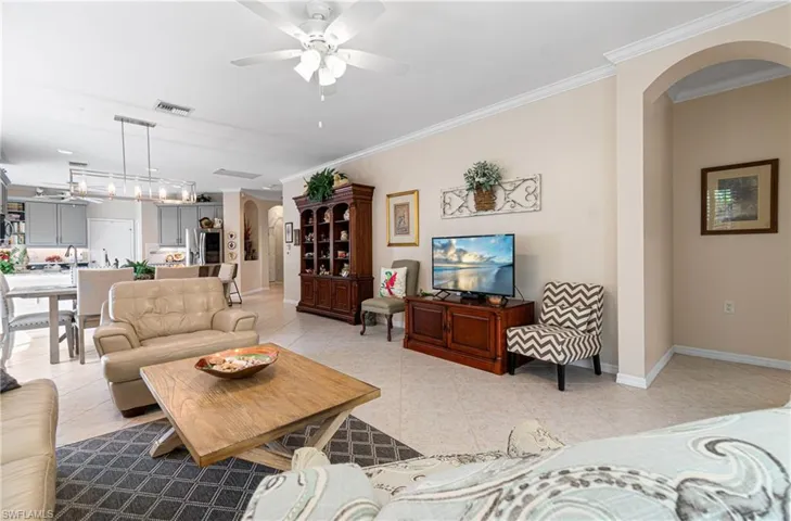 GREAT VIEW OF HOW OPEN THIS FLOOR PLAN IS EVEN WITH ALL THIS BEAUTIFUL FURNITURE! NOTE: THE HUTCH/BOOKSHELF DOES NOT CONVEY.