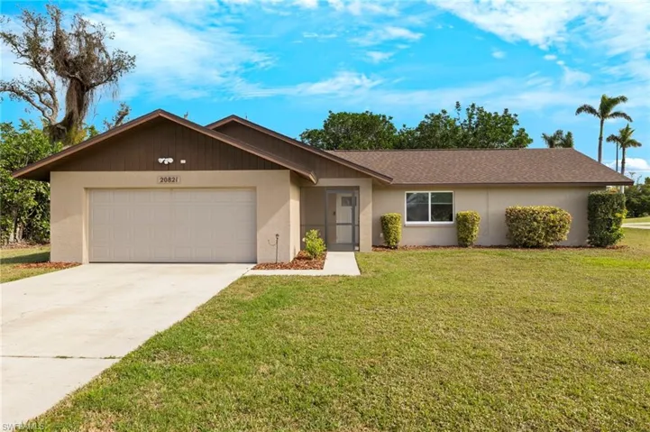 This property boasts a large corner lot, offering ample space for a refreshing pool.