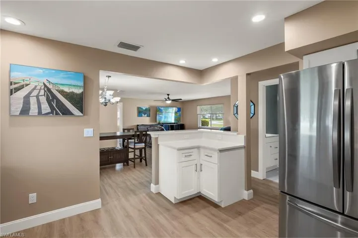 the kitchen and living area flowing together in a harmonious space.