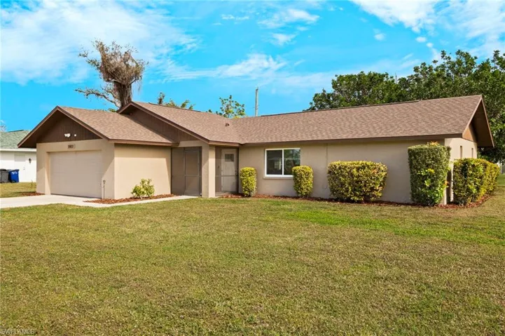 Ranch-style home featuring an attached 2 car garage