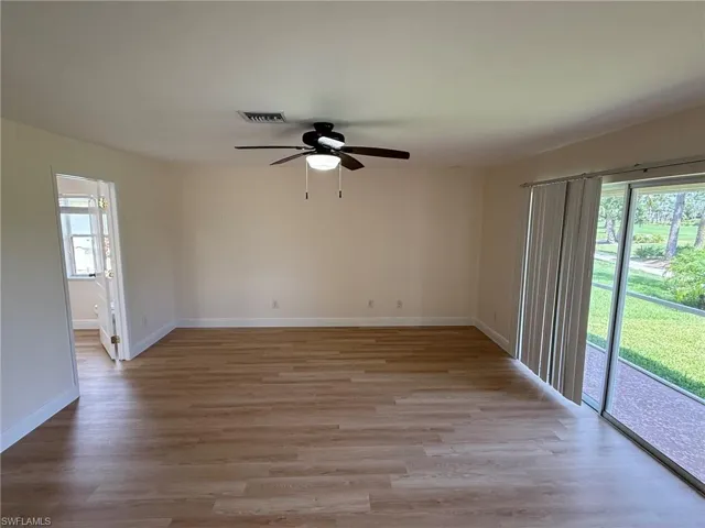 Primary Bedroom with Sliding Glass Door to Lanai