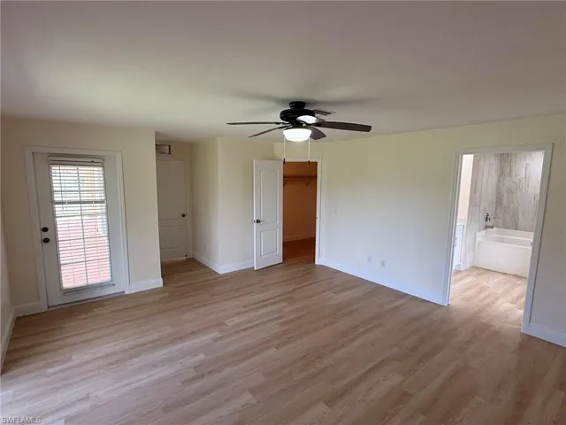 Primary Bedroom features a walk in closet
