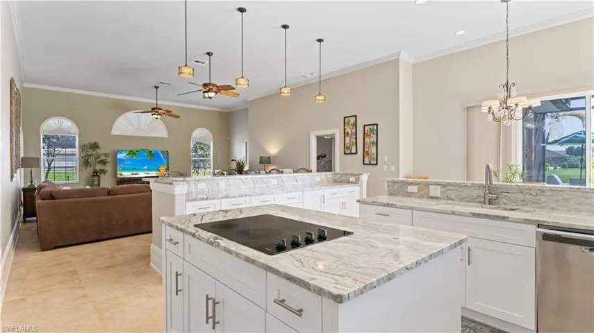 Double island???  Yes!!! Open to the living area?  Yes!!  Tons of room for entertaining - yess!!  This is a YES home - has such a great floor plan with plenty of room and designer touches throughout - its all in the details and this home is loaded with details!