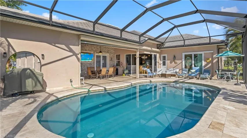 Kick back and relax in this beautiful pool and enjoy the SWFL life!