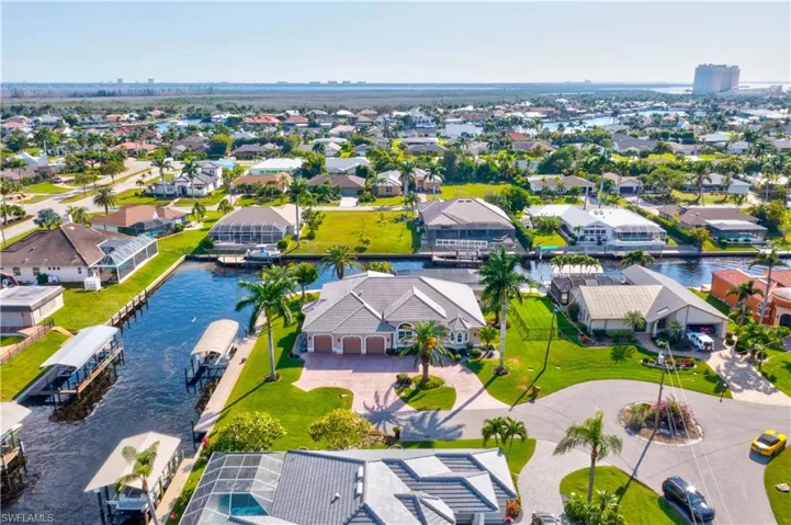 This aerial view shows how close you are to the Caloosahatchee River, the Westin Hotel and Fort Myers on the other side of the river!  Endless day trips by boat are at your fingertips - every direction gives you access to the numerous islands that surround us - Cabbage Key, Useppa, Boca Grande, Captiva and Sanibel as well as the beaches of Fort Myers and the new Margaritaville hotel!