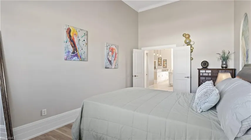 Currently used as the fourth bedroom - the den is supersized and offers 14 foot ceilings and a closet could be easily added.
