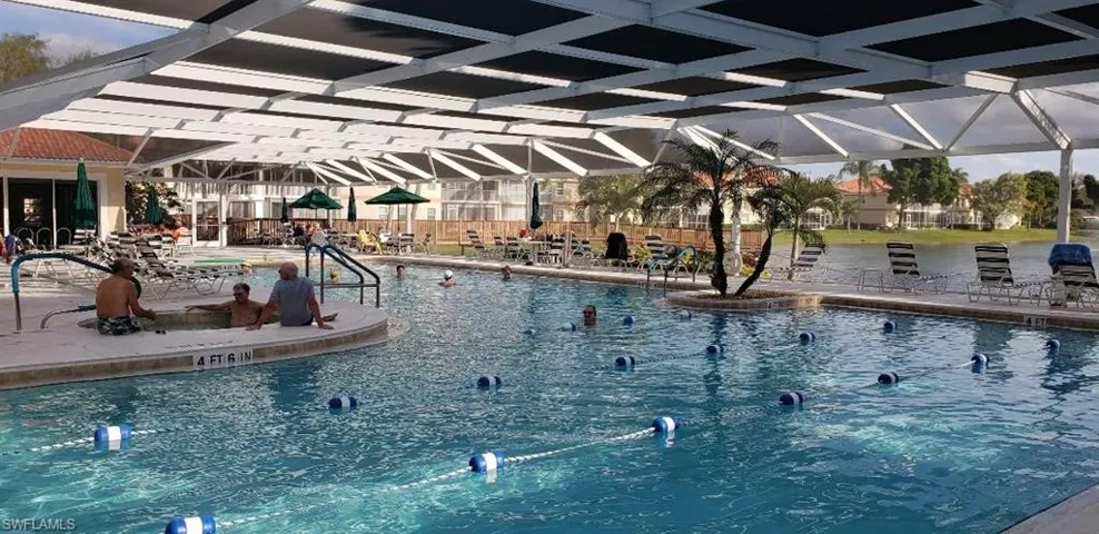 Community pool featuring a patio area and a lanai