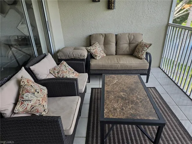 Balcony featuring an outdoor living space
