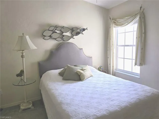 Bedroom with baseboards