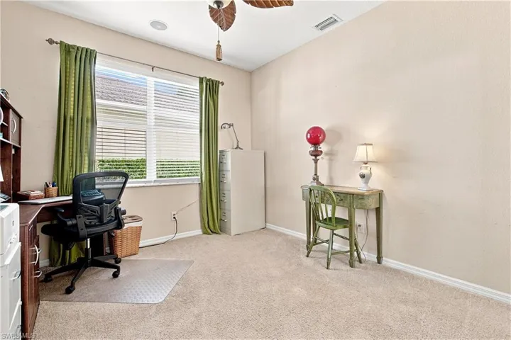 Second bedroom/office, carpeted room featuring a window with blinds