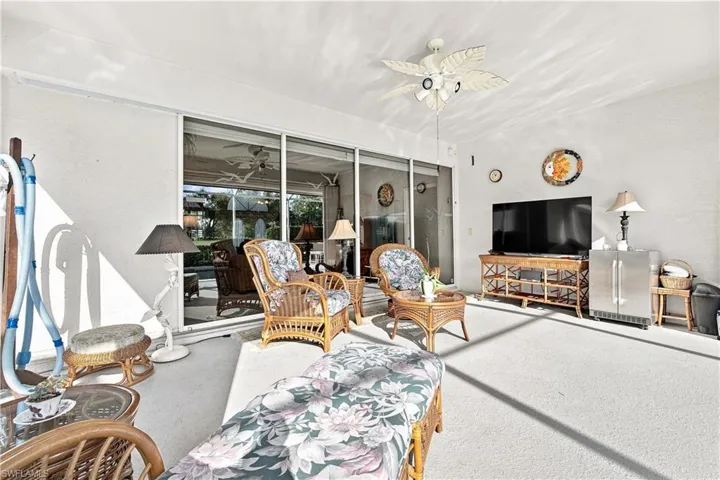 View of the lanai with larger sliding doors to home