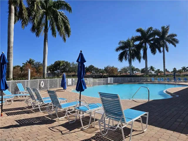 Community pool featuring a patio area