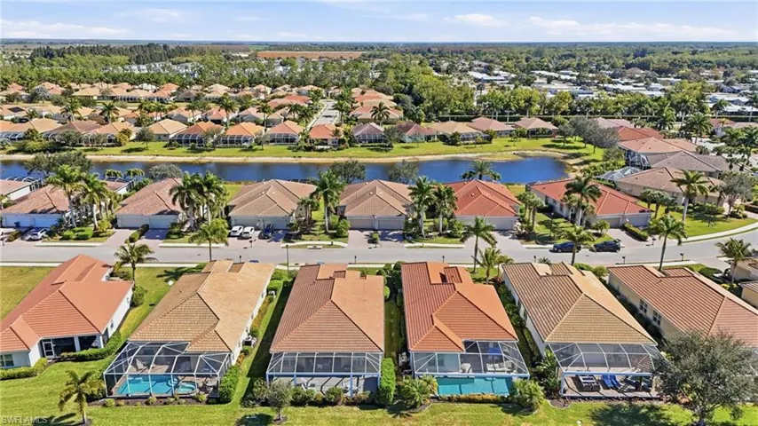 Aerial view of residential area with a large body of water