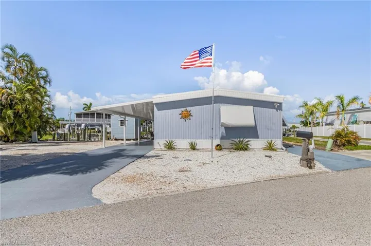 Front of home with oversized lot!!