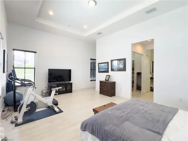 Bedroom featuring wood finished floors and recessed lighting