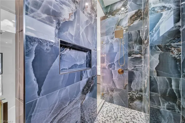 Bathroom with a tile shower