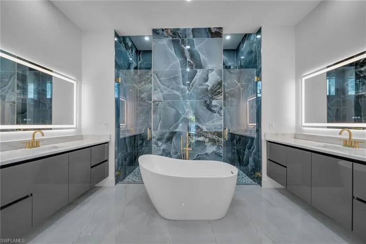 Bathroom with separate shower and tub and vanity