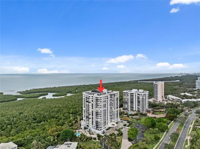 Aerial view featuring a water view