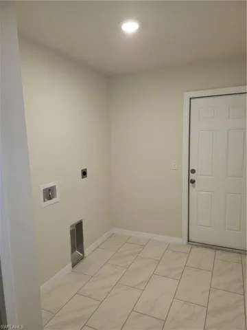 Laundry room with electric dryer hookup, recessed lighting, and hookup for a washing machine