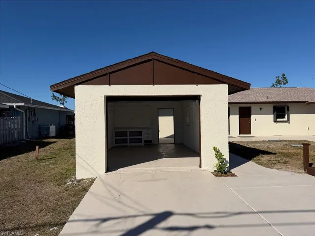 outside view with garage up