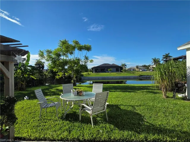 View of grassy yard featuring a water view