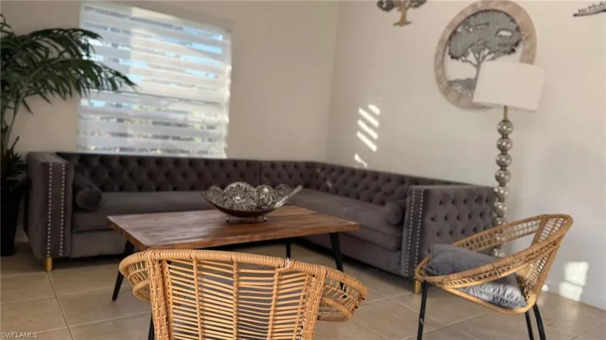 Living area with tile patterned floors