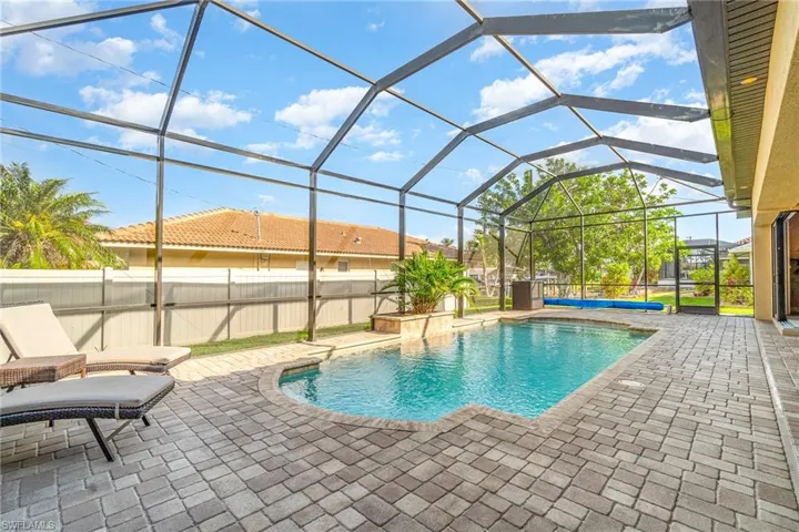 View of pool featuring a lanai and a patio