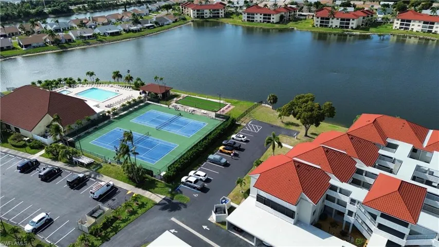 Aerial view of residential area with a large body of water