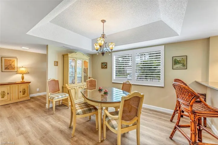 Dining Area. Plantation shutters on windows.
