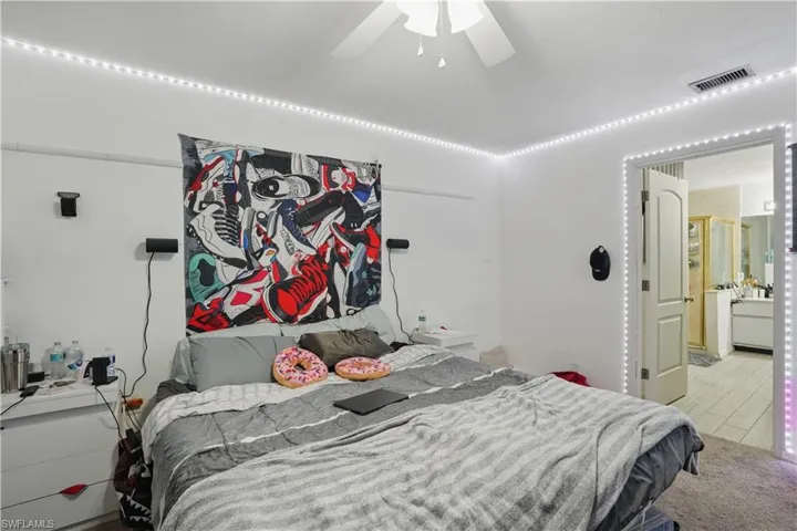 Bedroom with carpet floors and ceiling fan