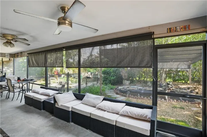 Sunroom / solarium featuring an outdoor living space