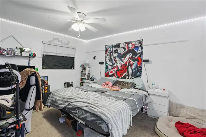 Bedroom featuring carpet floors and a ceiling fan