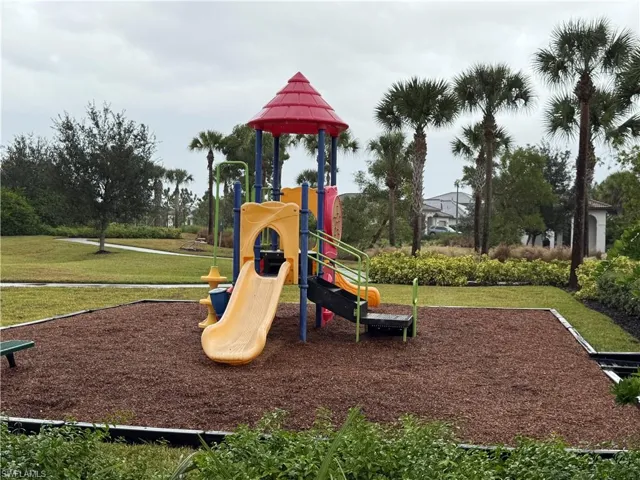 Communal playground featuring a lawn