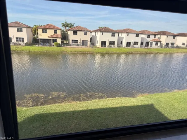 Water view with nearby suburban area