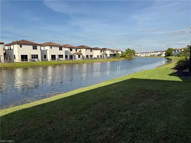 Water view featuring nearby suburban area