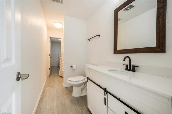 Guest Bathroom With Laundry Room Behind It