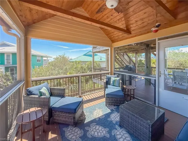 Wooden deck featuring an outdoor hangout area
