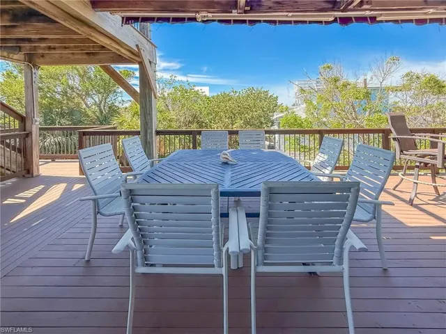 Wooden deck with outdoor dining area