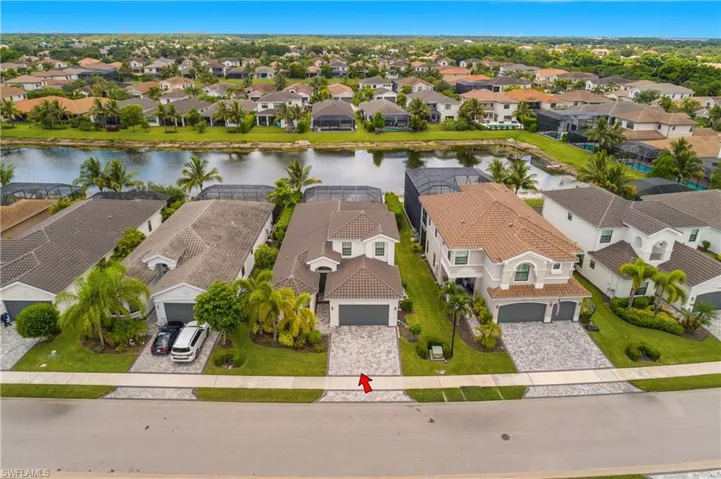 Aerial view of residential area with a nearby body of water