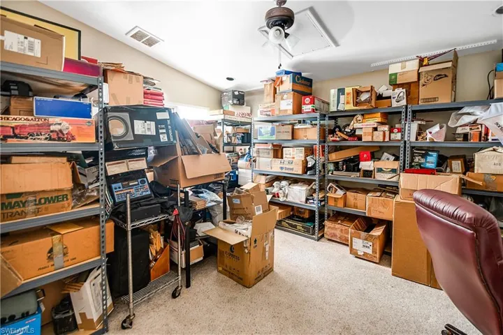 Storage room featuring ceiling fan