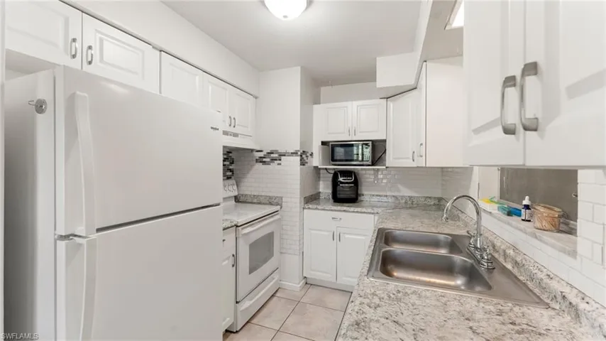 908 E Jasmine  RD, Lehigh Acres, FL 33936