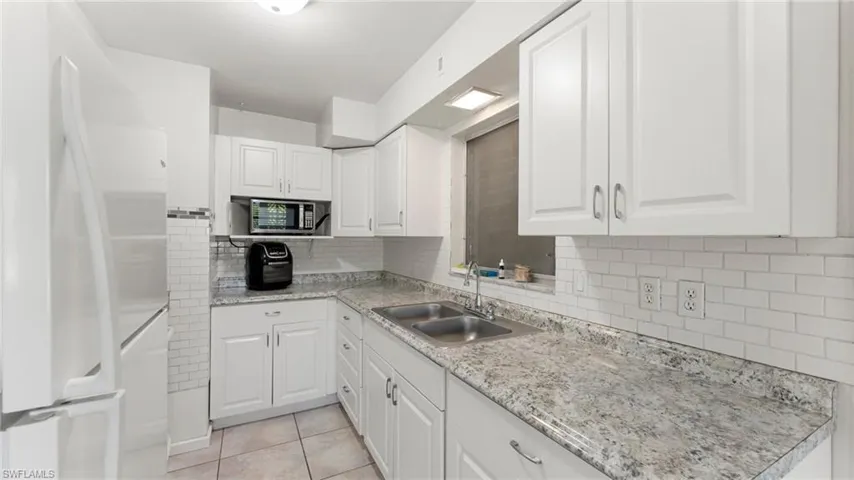 908 E Jasmine  RD, Lehigh Acres, FL 33936